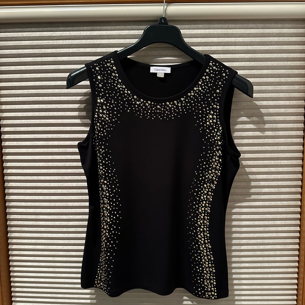 Woman’s Calvin Klein sleeveless shirt